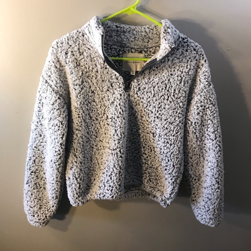 Super soft and puffy pullover sweater-XS-quarter zip with an adjustable bottom.